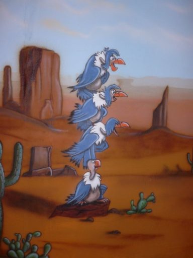 4 Comic-Geier in einer Wüstenszene