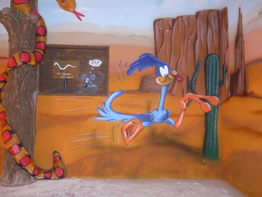 Rennender Roadrunner in der Wüste im Comicstil, Airbrushtechnik