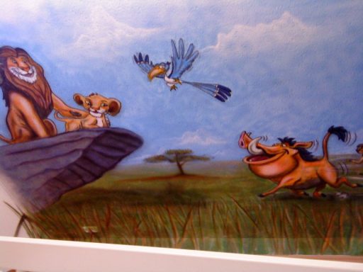 König der Löwen in einem Kinderzimmer auf der Wandschräge, Airbrushstil